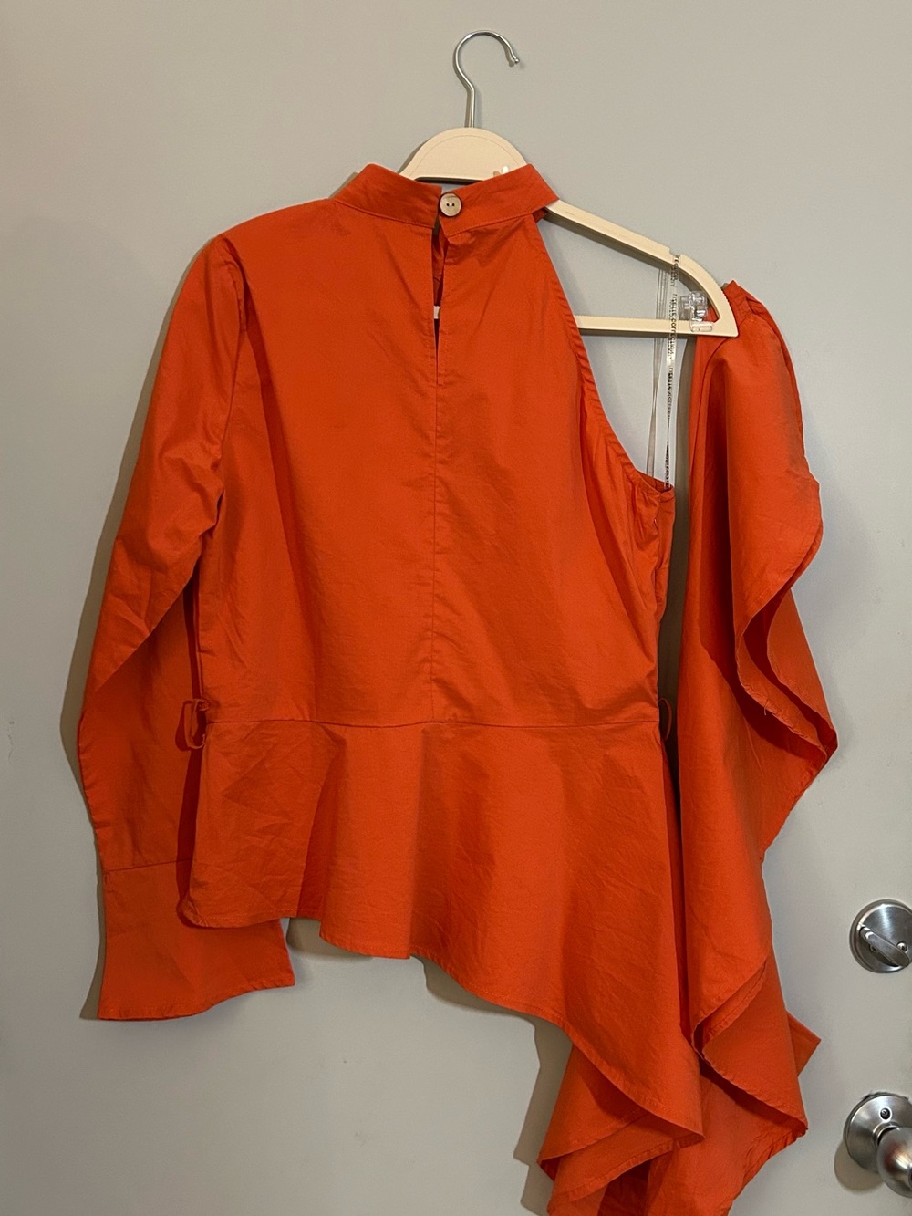 Lizette Collection One-Shoulder Asymmetrical Peplum Blouse in Orange - Picture 9 of 9